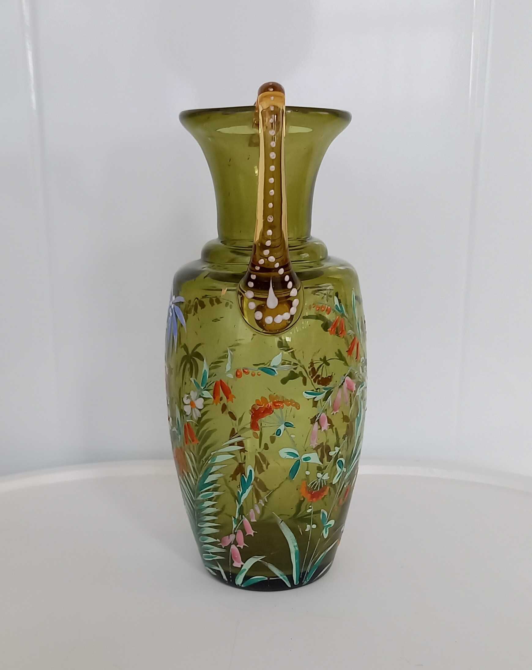 Enamelled green glass vase