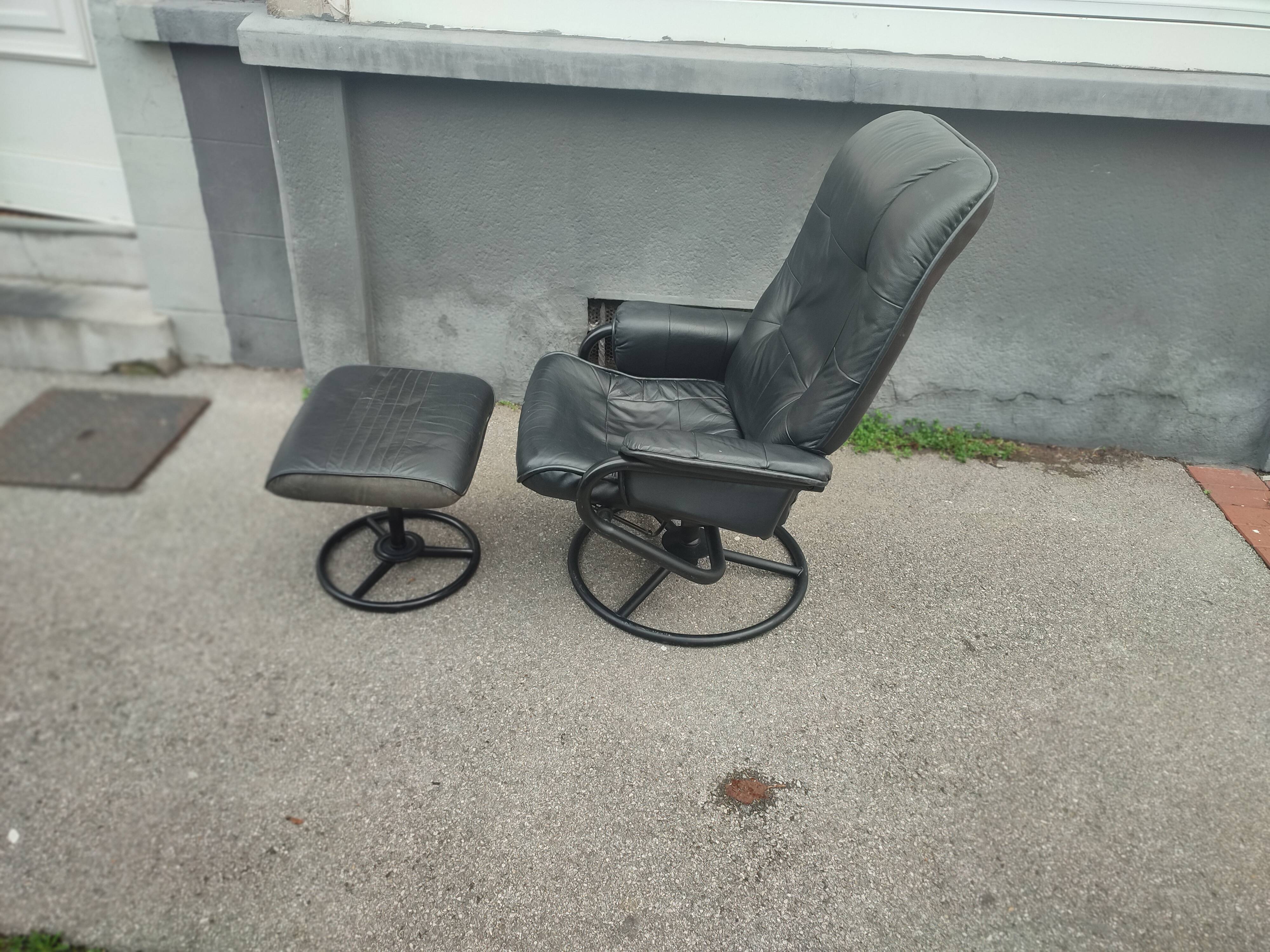 Scandinavian design leather armchair and footrest
