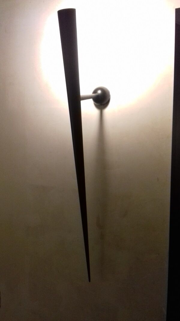 Trylon wall light by Gilles Derain