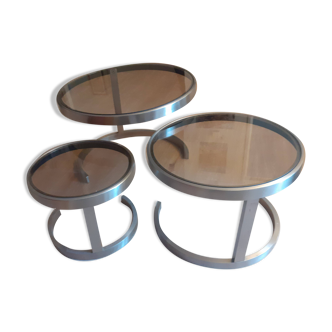 Nesting coffee tables in brushed steel and smoked glass, France, 1970s