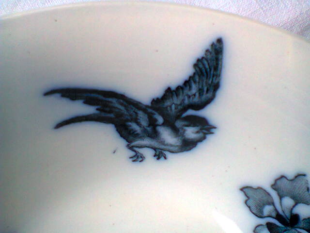Ramekin in earthenware with decoration of flowers, butterflies and birds