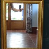 Empire period mirror, early nineteenth in gilded stucco wood H 72 cm