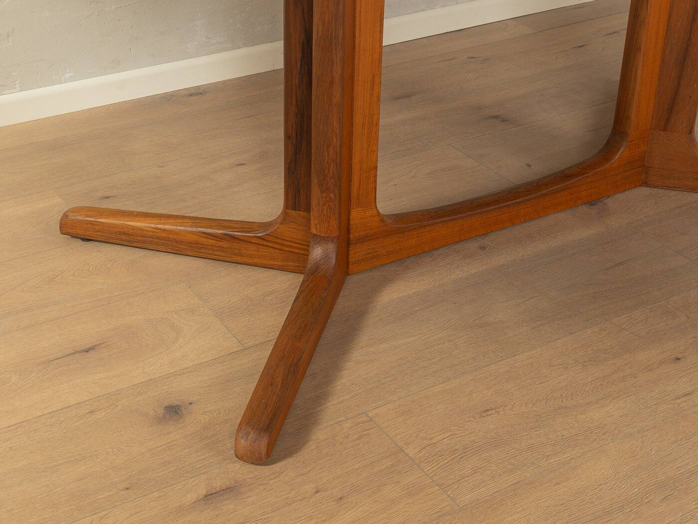 Glostrup dining table, 1980s, solid teak, by Johs. Kristoffersen & Søn, with two extension leaves