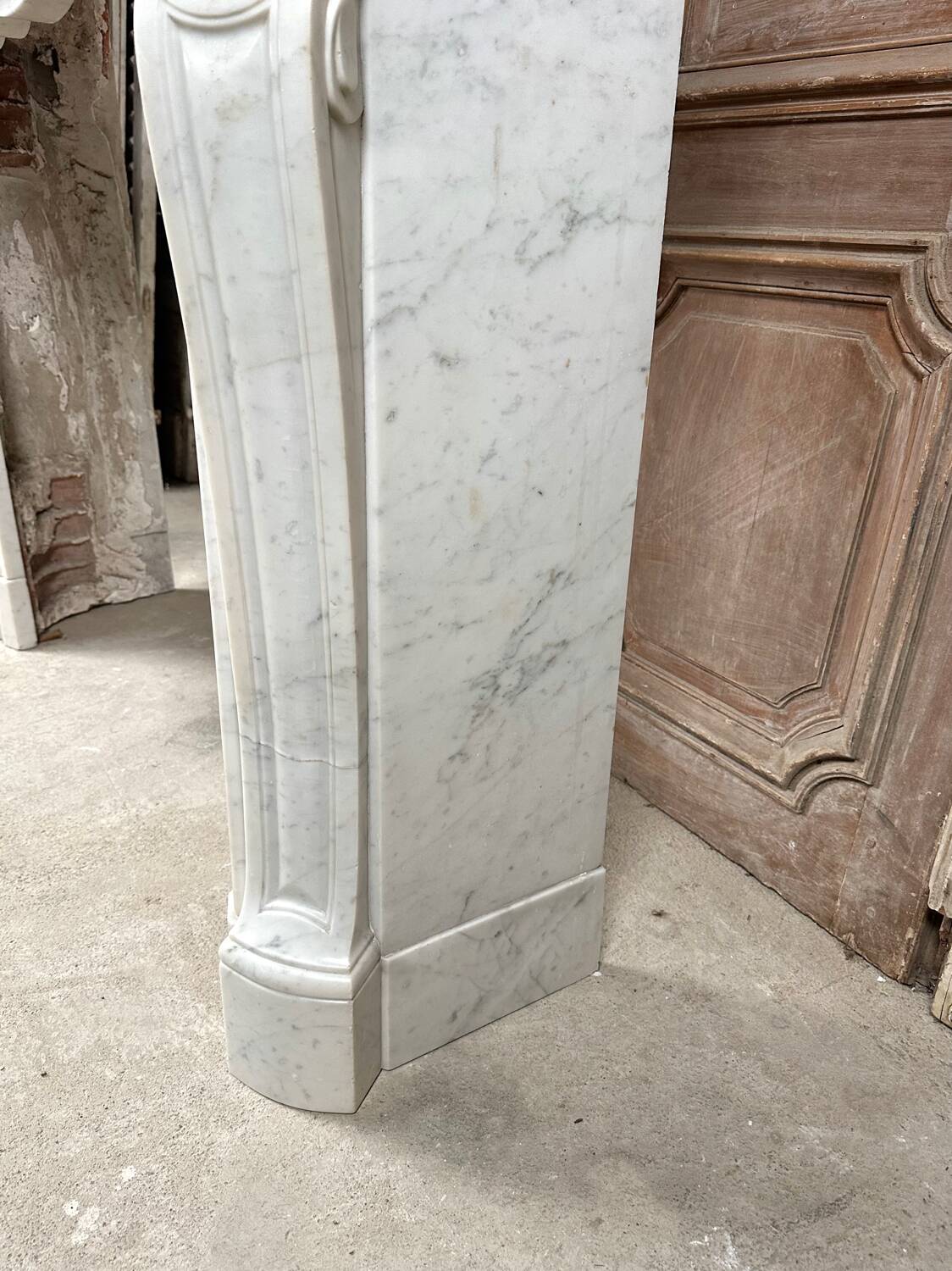 Louis XV style fireplace in white marble