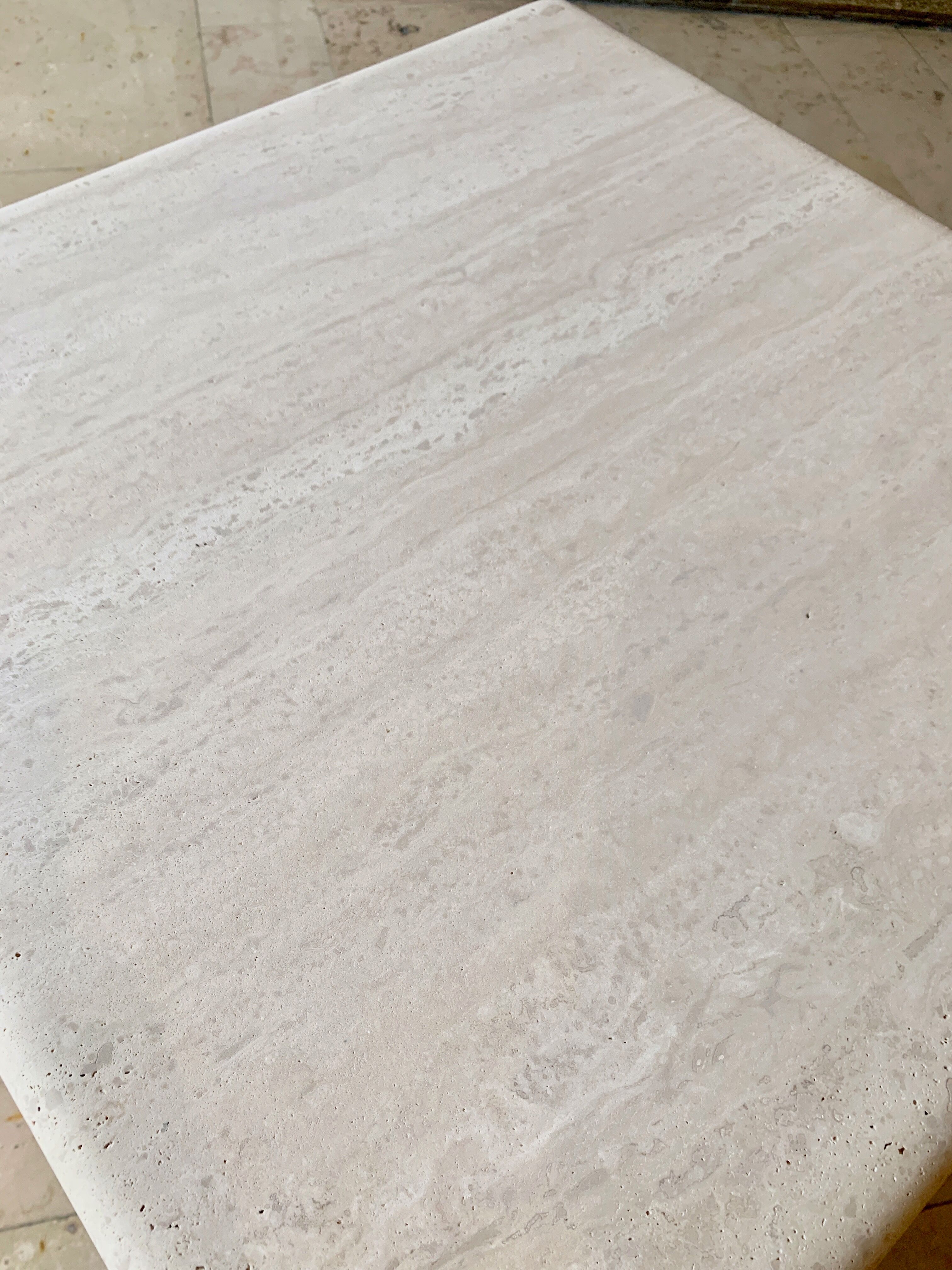 Square coffee table in softened travertine by berraldacci design collection