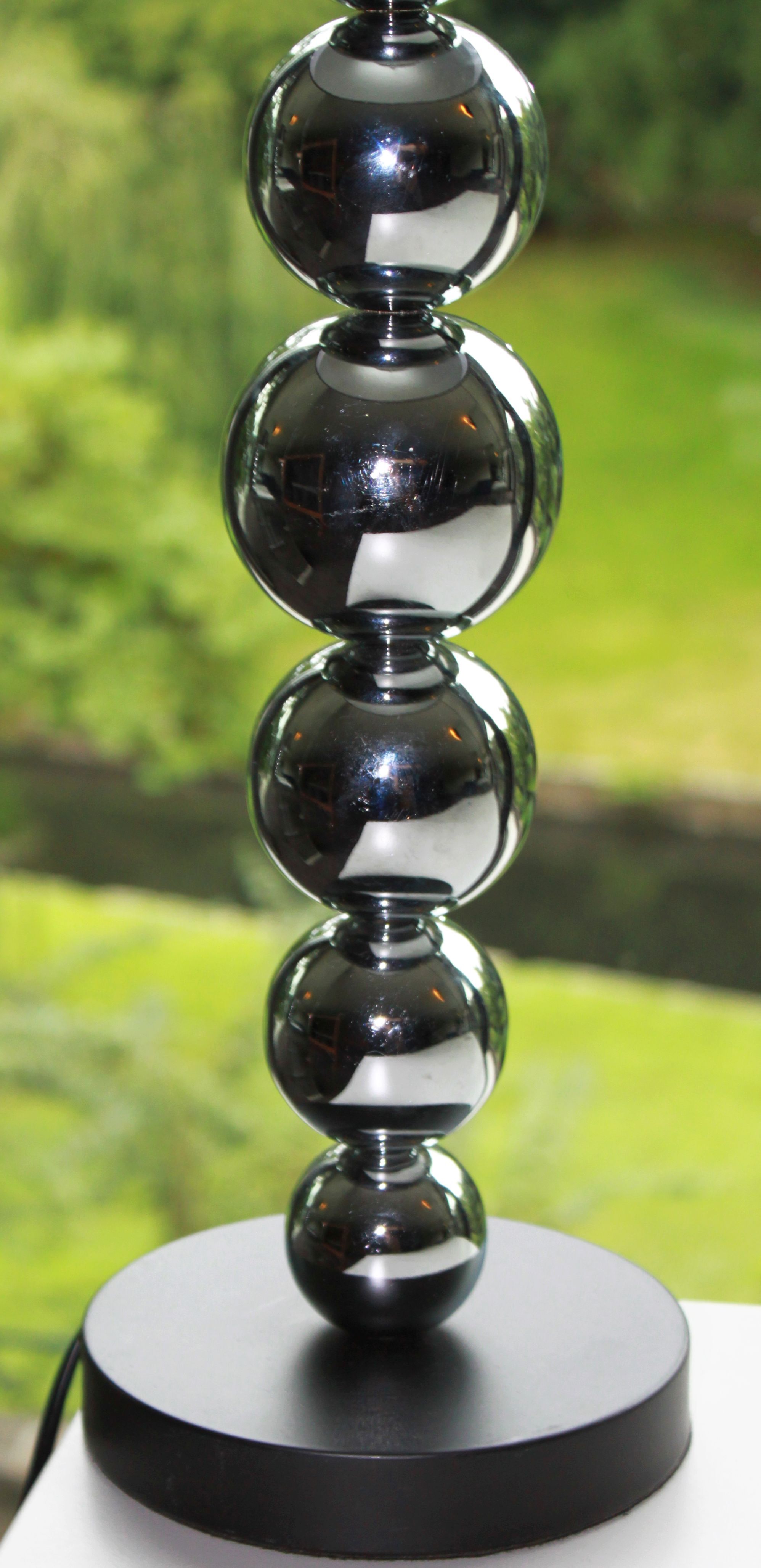 Pair of contemporary lamps with chrome base and 20th-century shade.