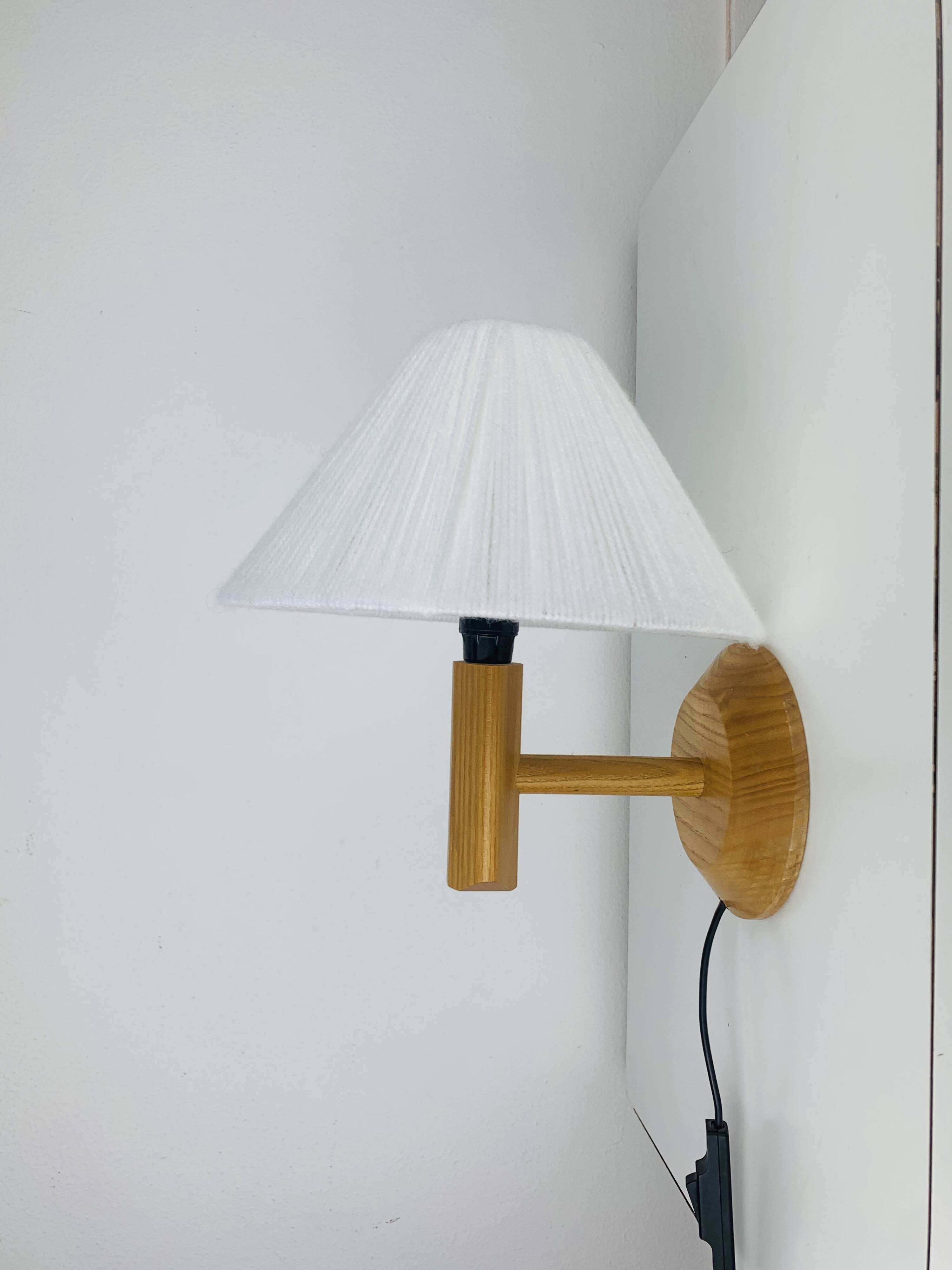 Vintage pine wall lamp and wool lampshade, 1960s
