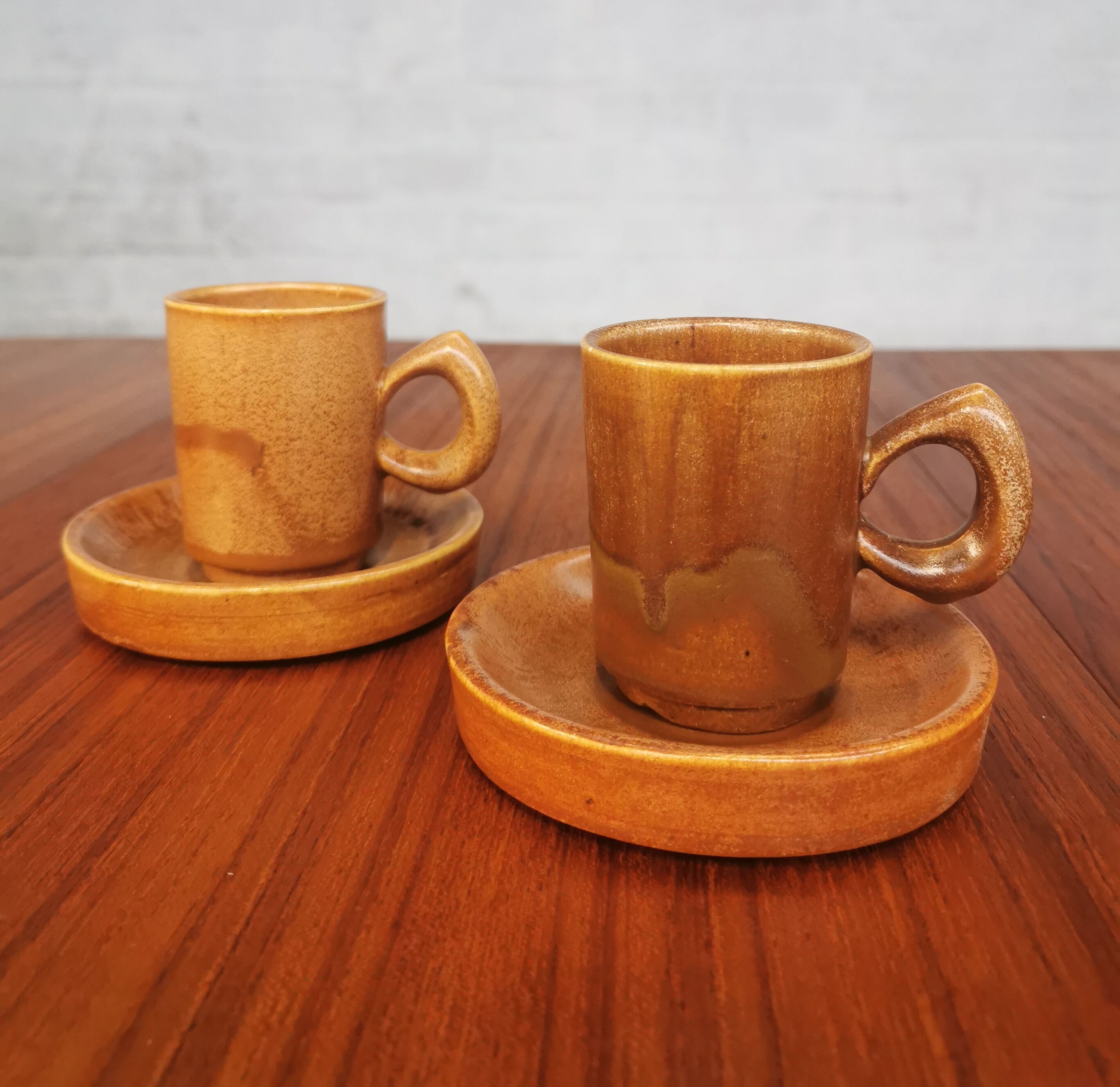 Duo of vintage stoneware cups