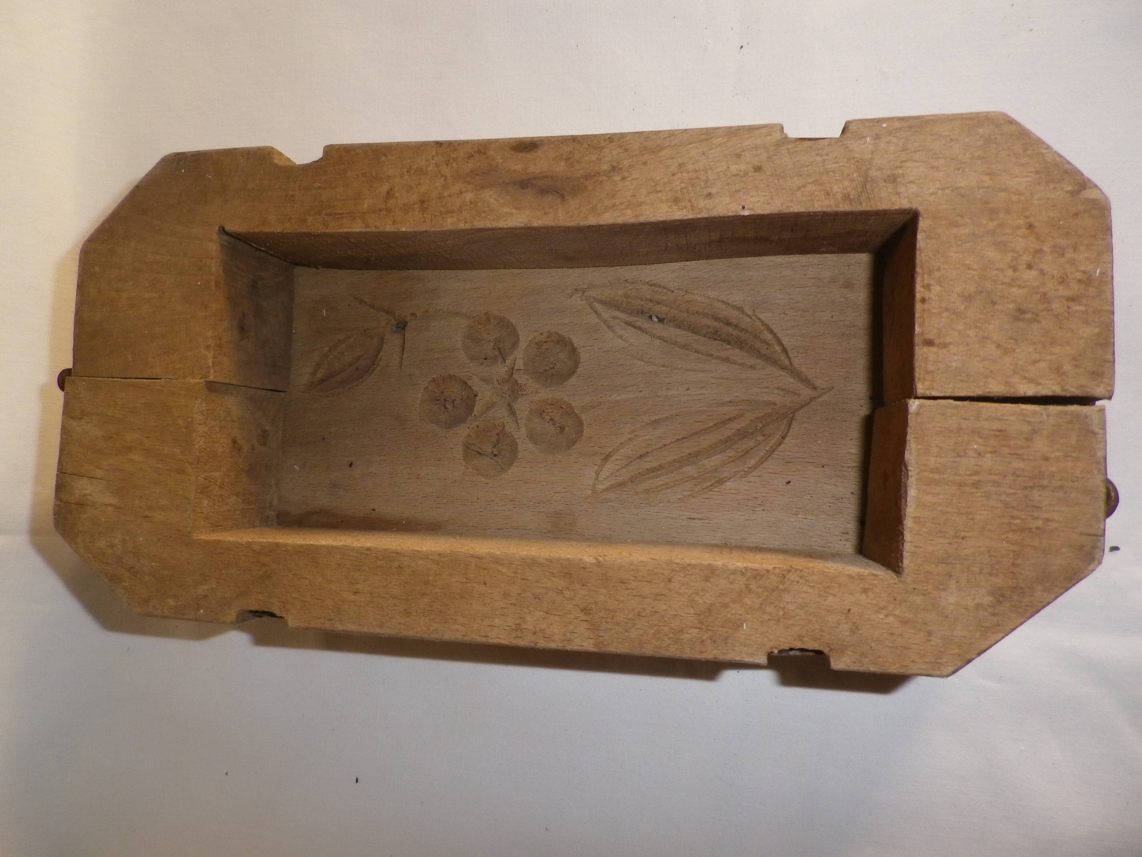 old wooden butter mold