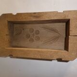old wooden butter mold