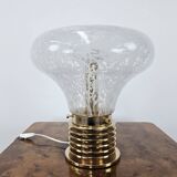 1970s table lamp in worked glass and gold metal