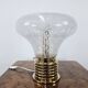1970s table lamp in worked glass and gold metal