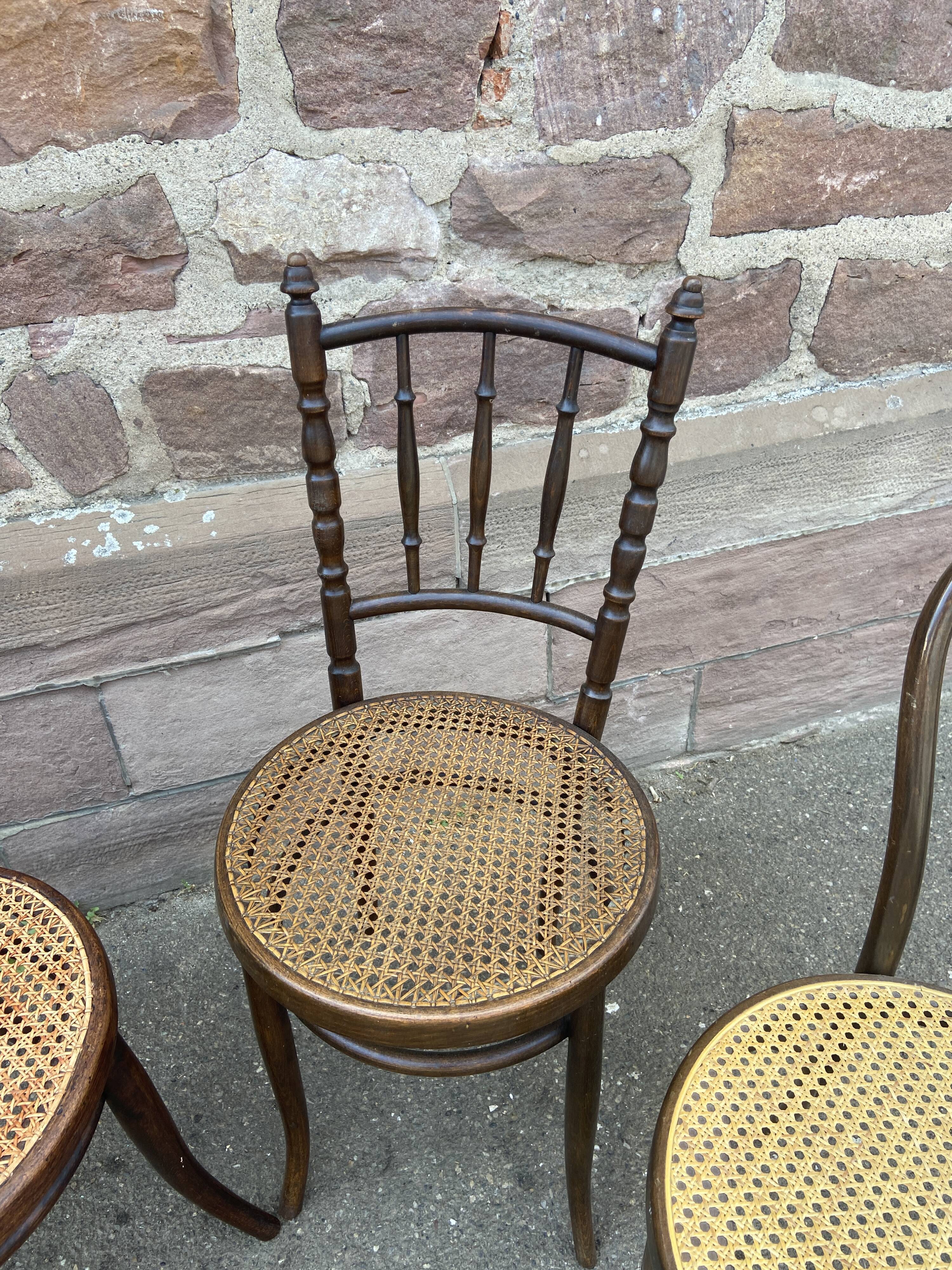 Set of 4 Mismatched wooden bistro chairs