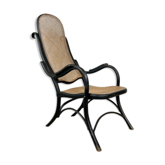 Antique black bentwood and cane lounge armchair by Thonet 19th century