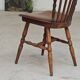 Baumann Tacoma bistro chair, wood and brown faux leather, 1960.