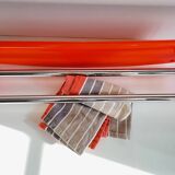 Orange towel rack by Syla from the 70s