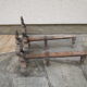 Paire de chenets anciens en acier et bronze