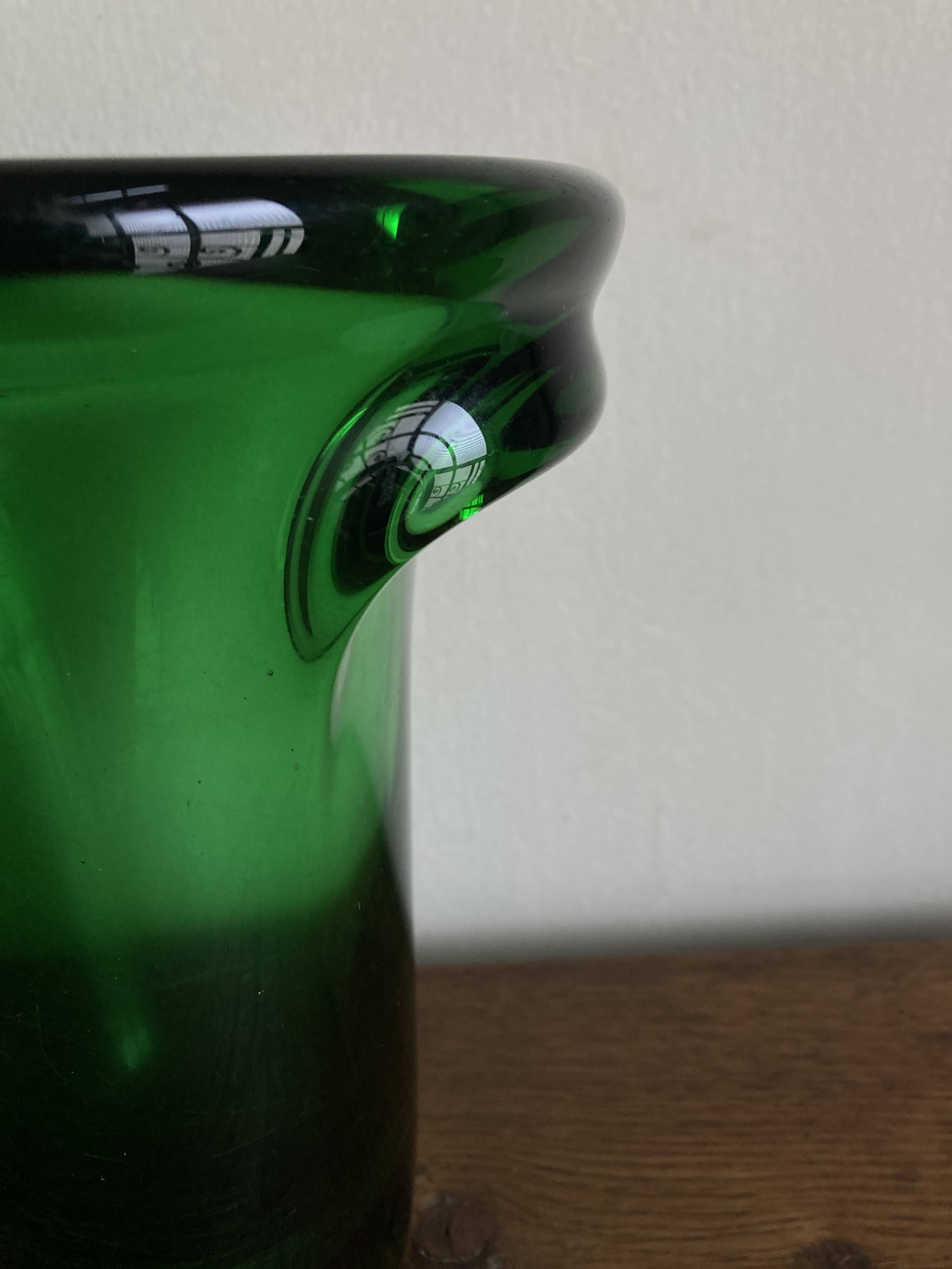 1950s Médicis vase, large Art Deco with handles, made of green blown glass.