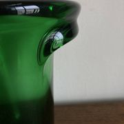 1950s Médicis vase, large Art Deco with handles, made of green blown glass.