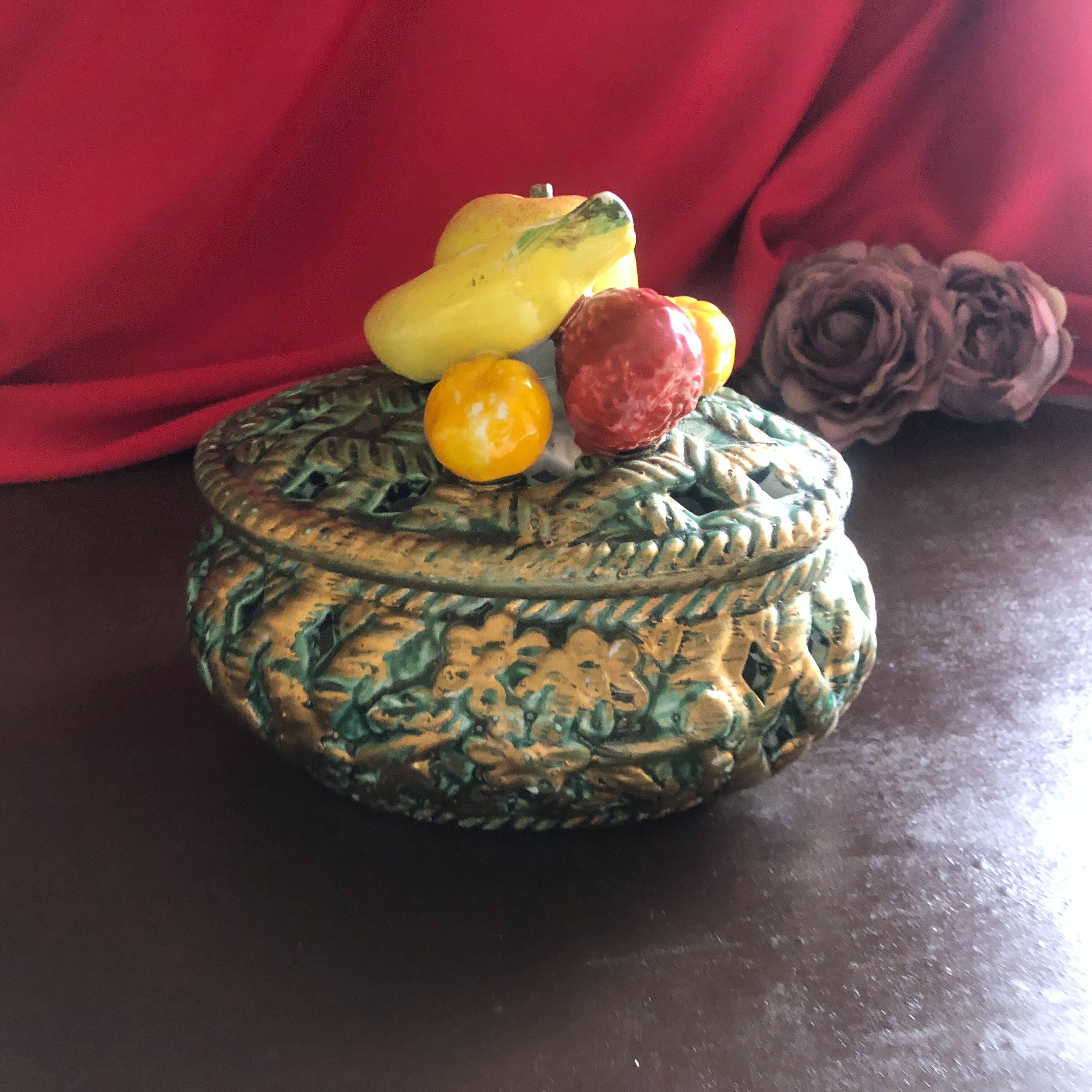 Openwork earthenware candy box with fruit slip