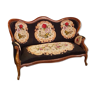 Two-seater sofa from the 1950s with wooden structure and covered with an embroidered fabric