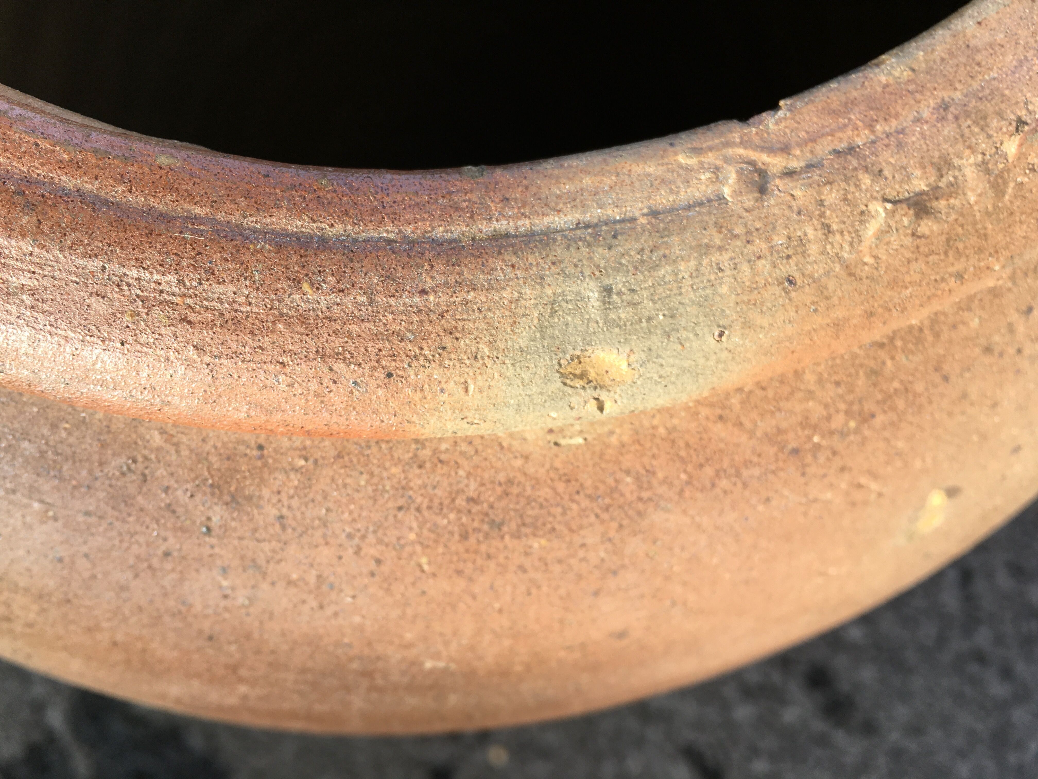 Old jug with two sandstone handles