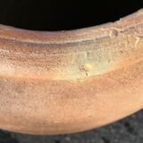 Old jug with two sandstone handles