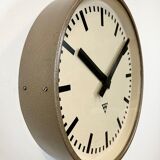 Brown industrial factory wall clock from Pragotron, 1960s