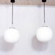 Pair of opal glass pendant lights