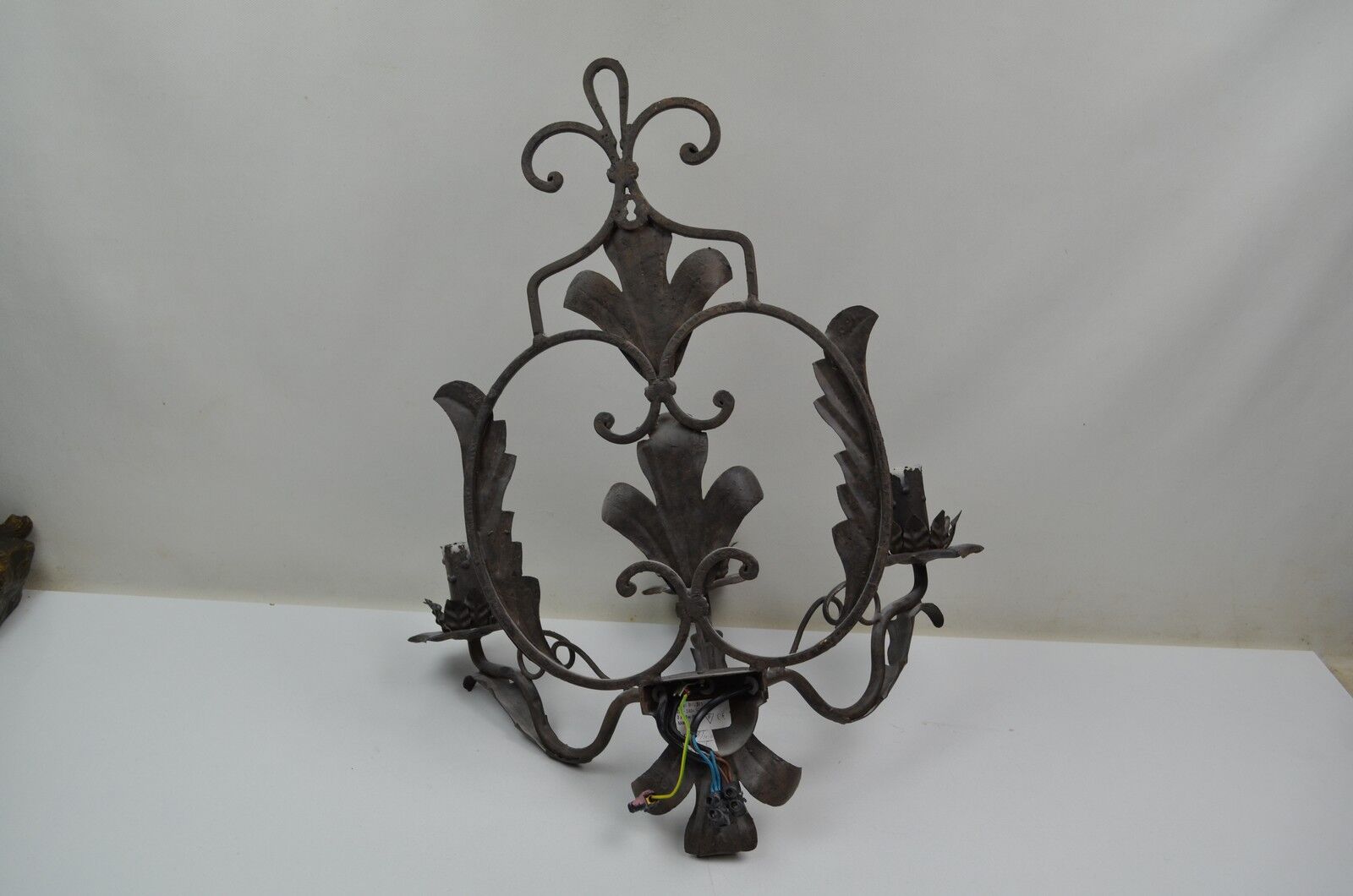 Pair of grey patinated iron wall lamps