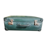 Green suitcase in vulcanized fibre
