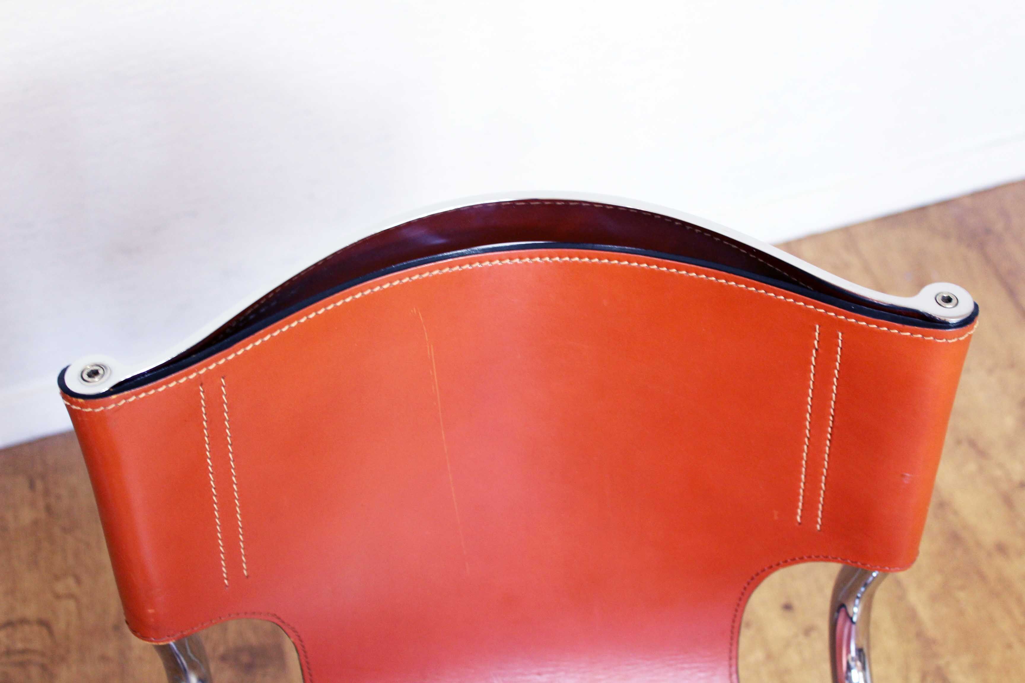 Pair of chairs in leather and chrome tube