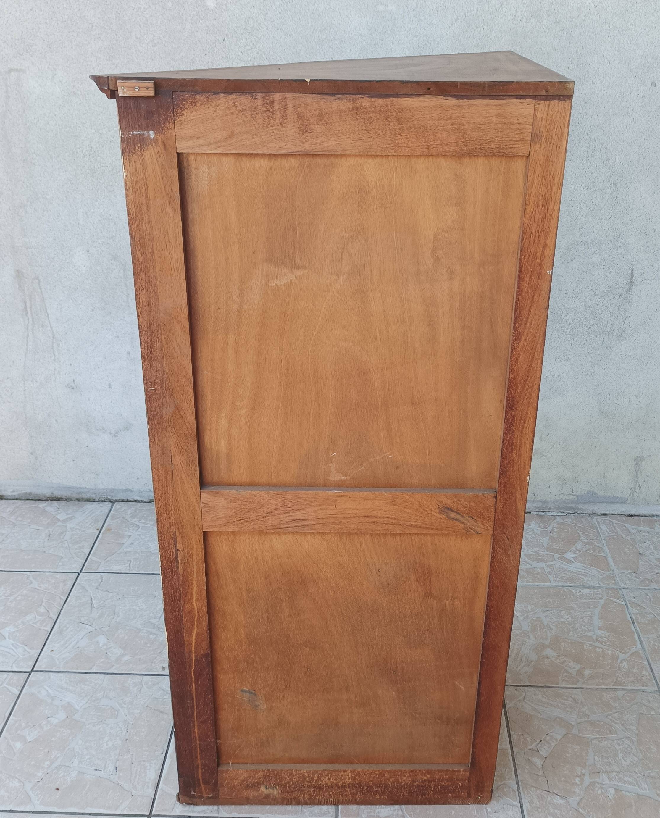 Corner cabinet in carved walnut, Savoyard style.