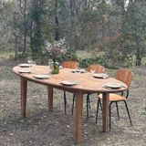 Oval solid wood dining table