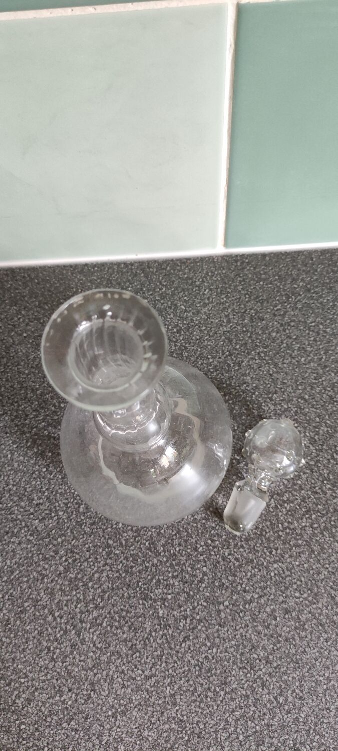 Antique decanter with its original cap