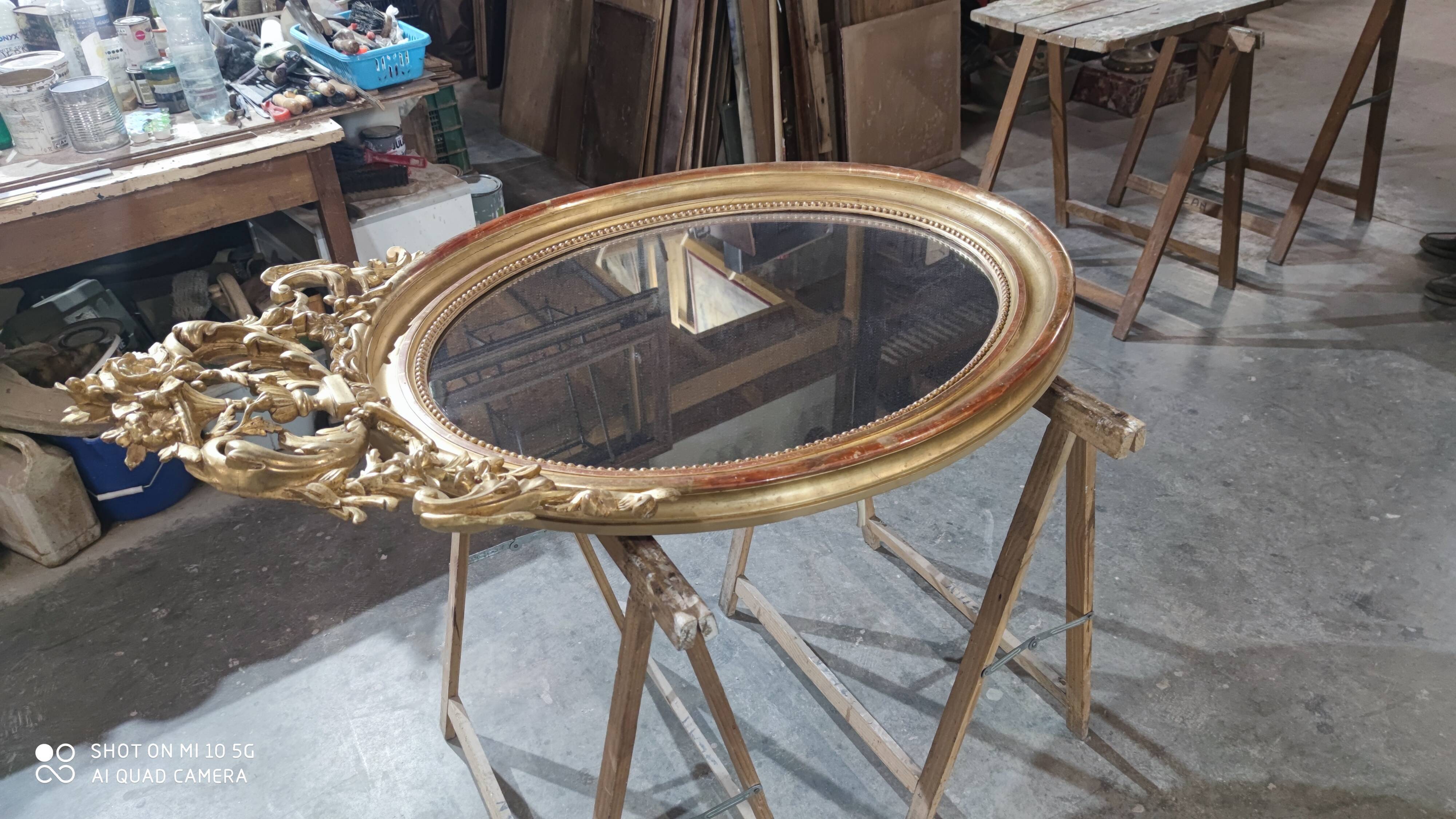 Mirror with a gilt medallion pediment, 1840