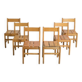 Set of six solid pine chairs by Maison Regain.