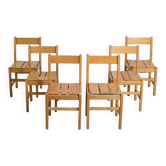 Set of six solid pine chairs by Maison Regain.