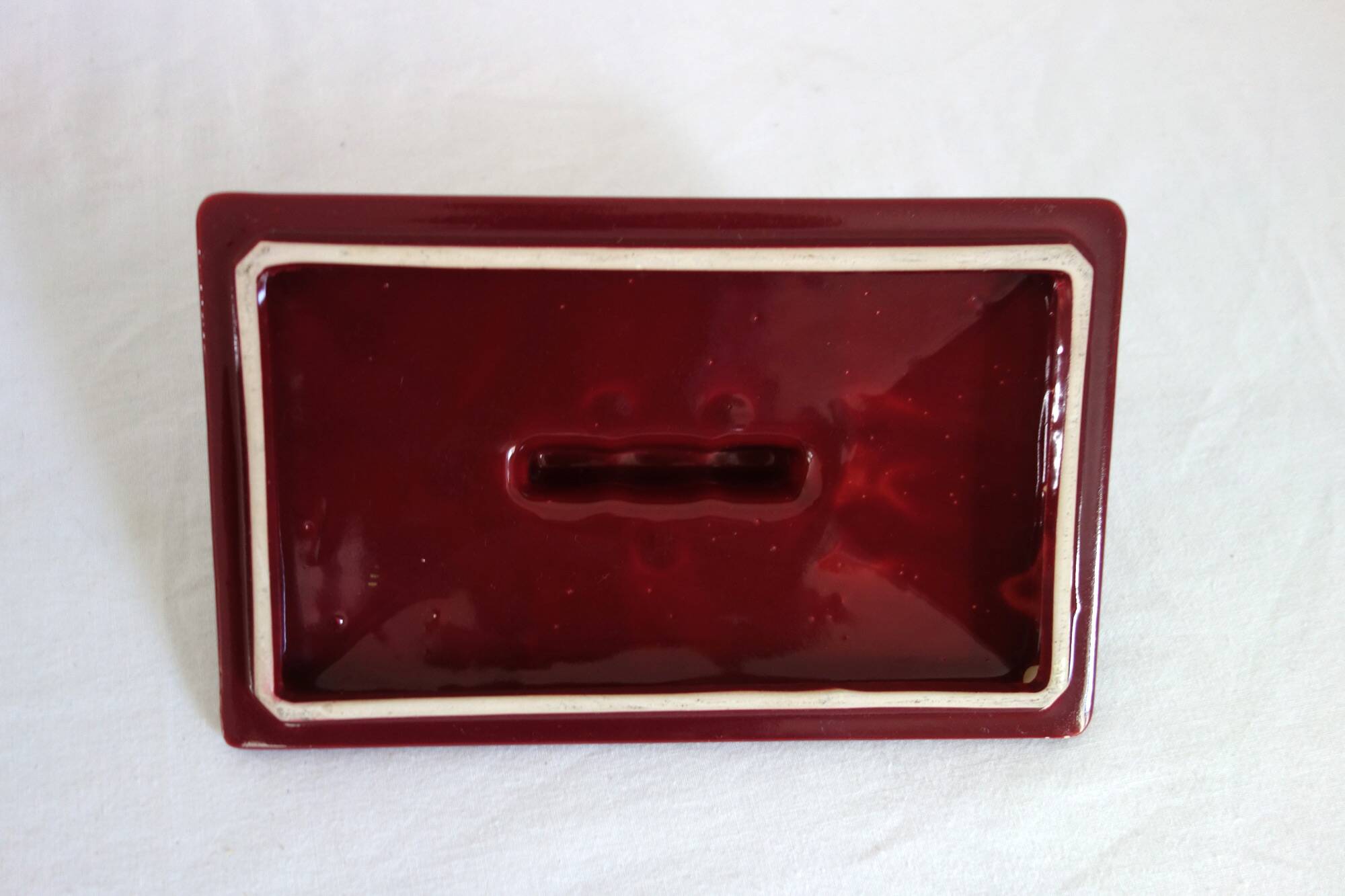Art Deco box in burgundy ceramic art Poët Laval