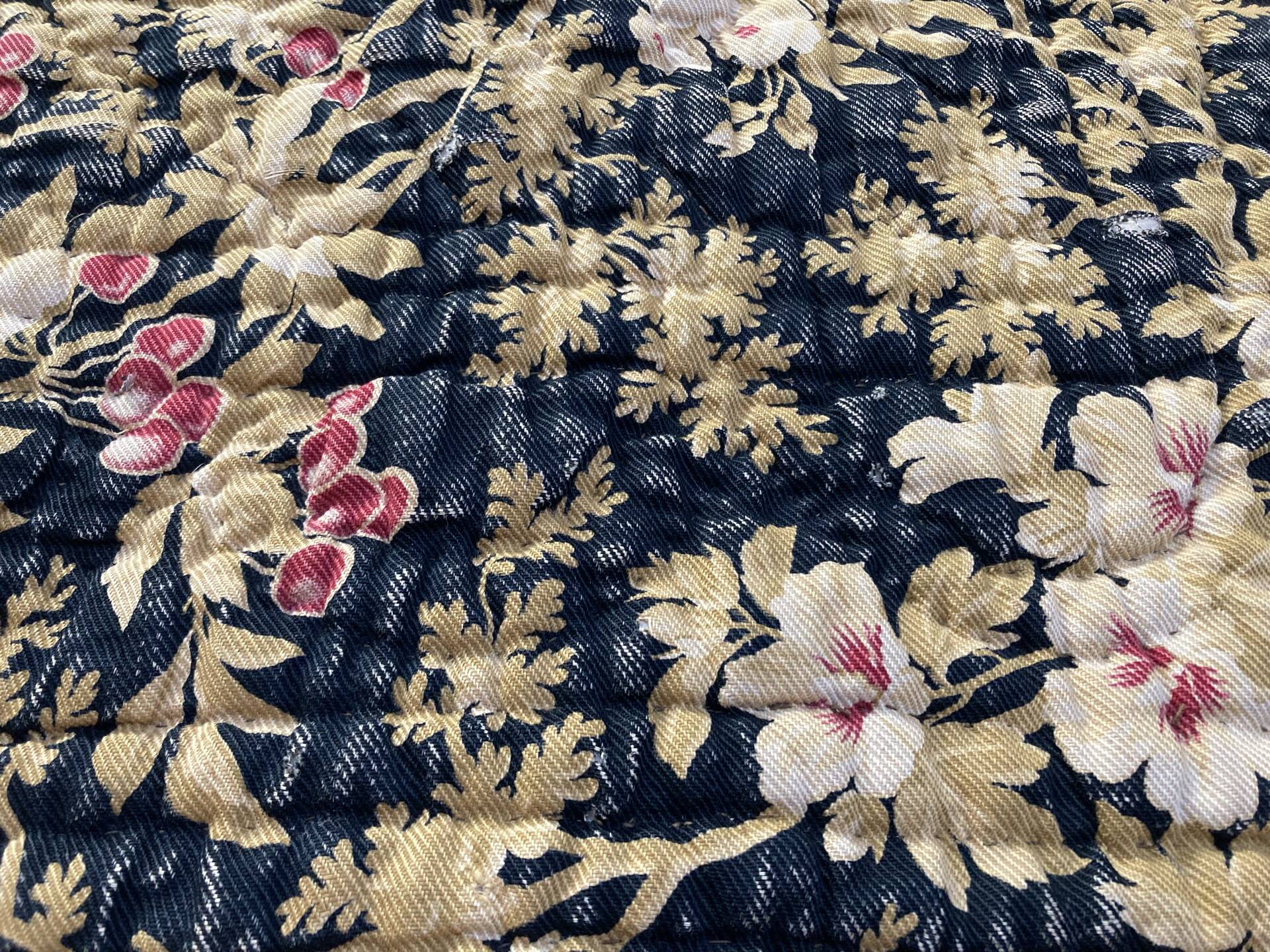 Antique hand-stitched boutis bedspread, floral fabric, 19th century.