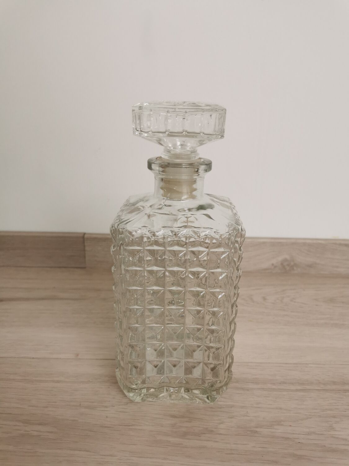 Carved old whisky decanter