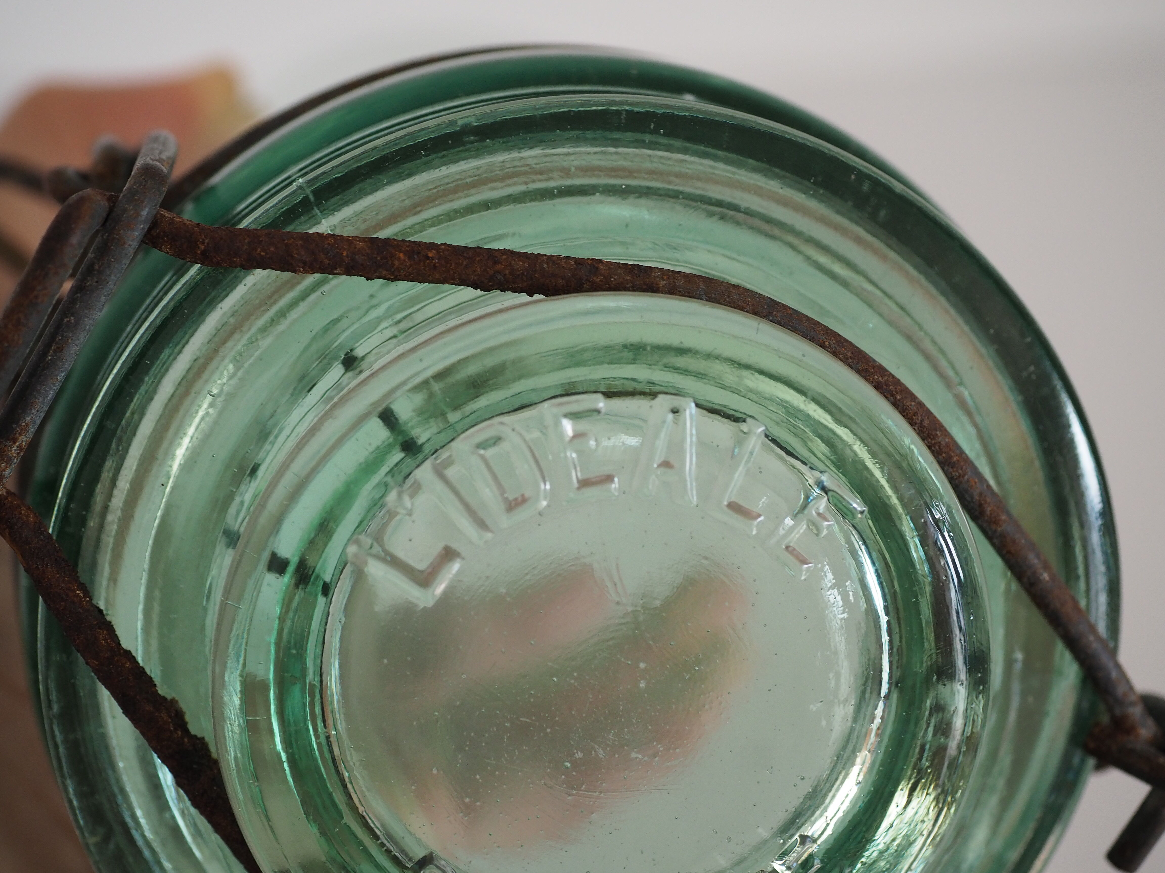 Green "ideale" glass canning jar