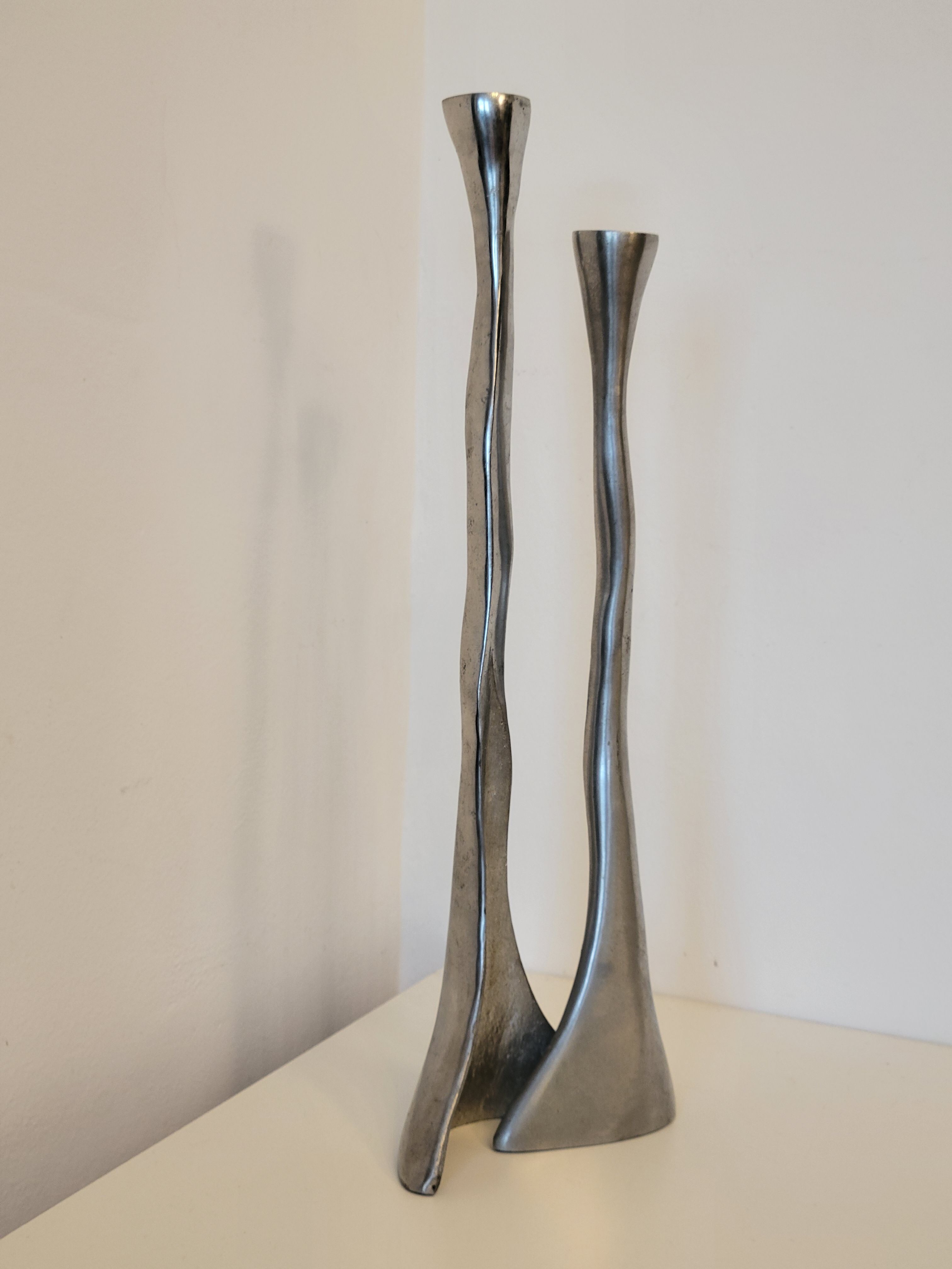 Pair of brutalist metal candlesticks in organic shape sleek design