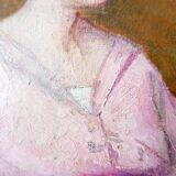 Huile sur toile - non signée - représente une femme assise à côté d'un vase de fleurs.
