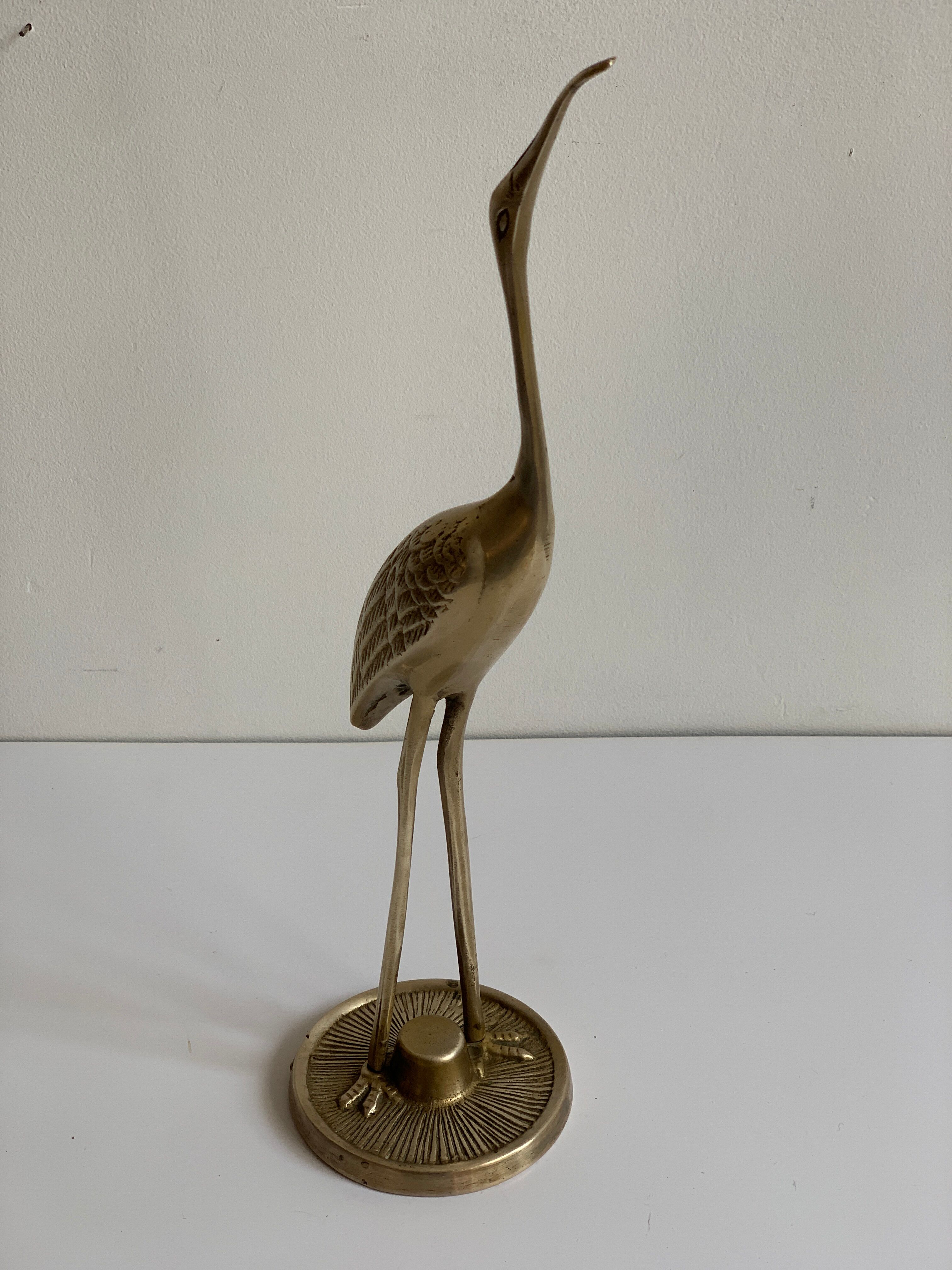 Brass heron