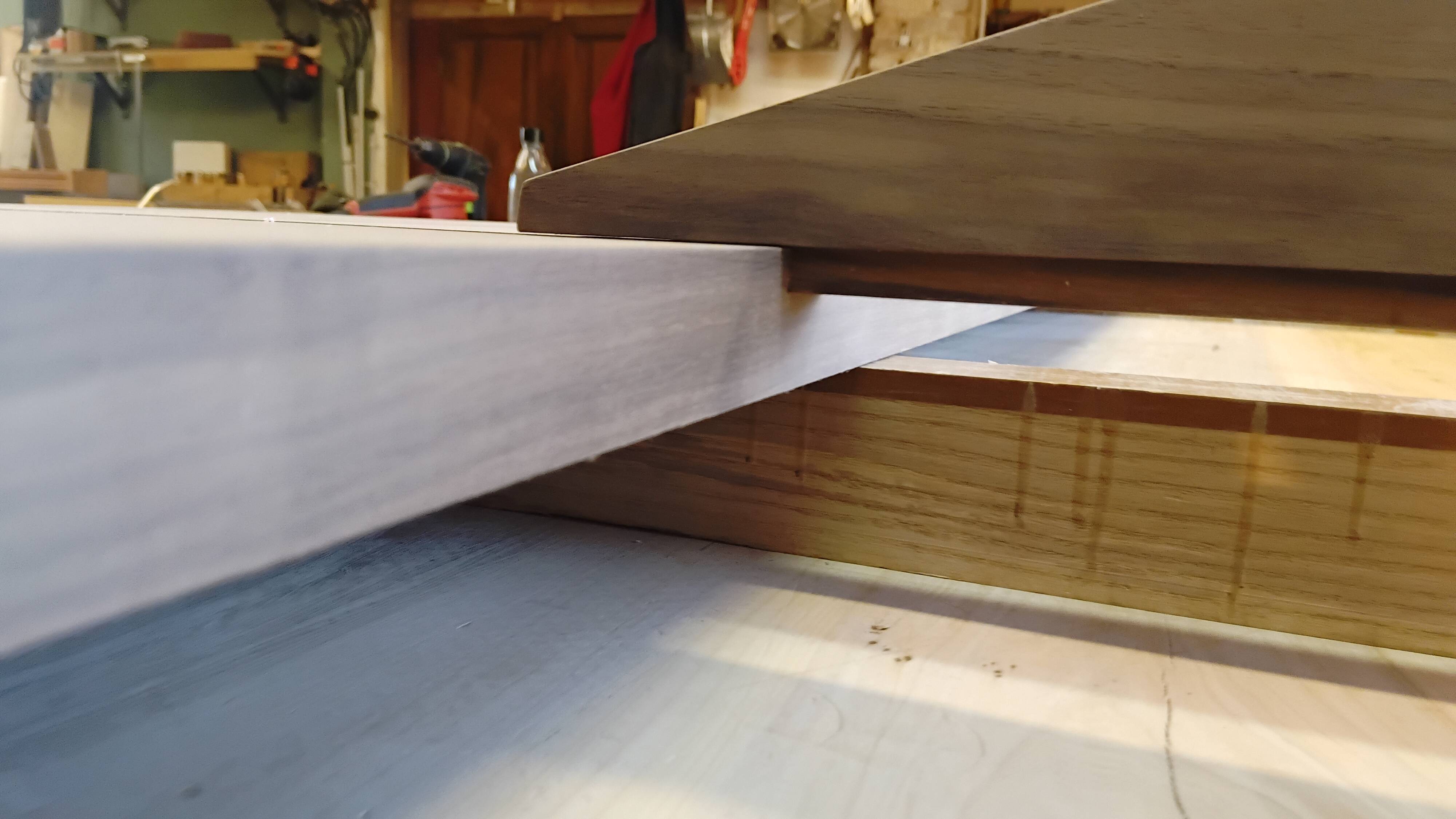 Exceptional dining table in solid walnut.