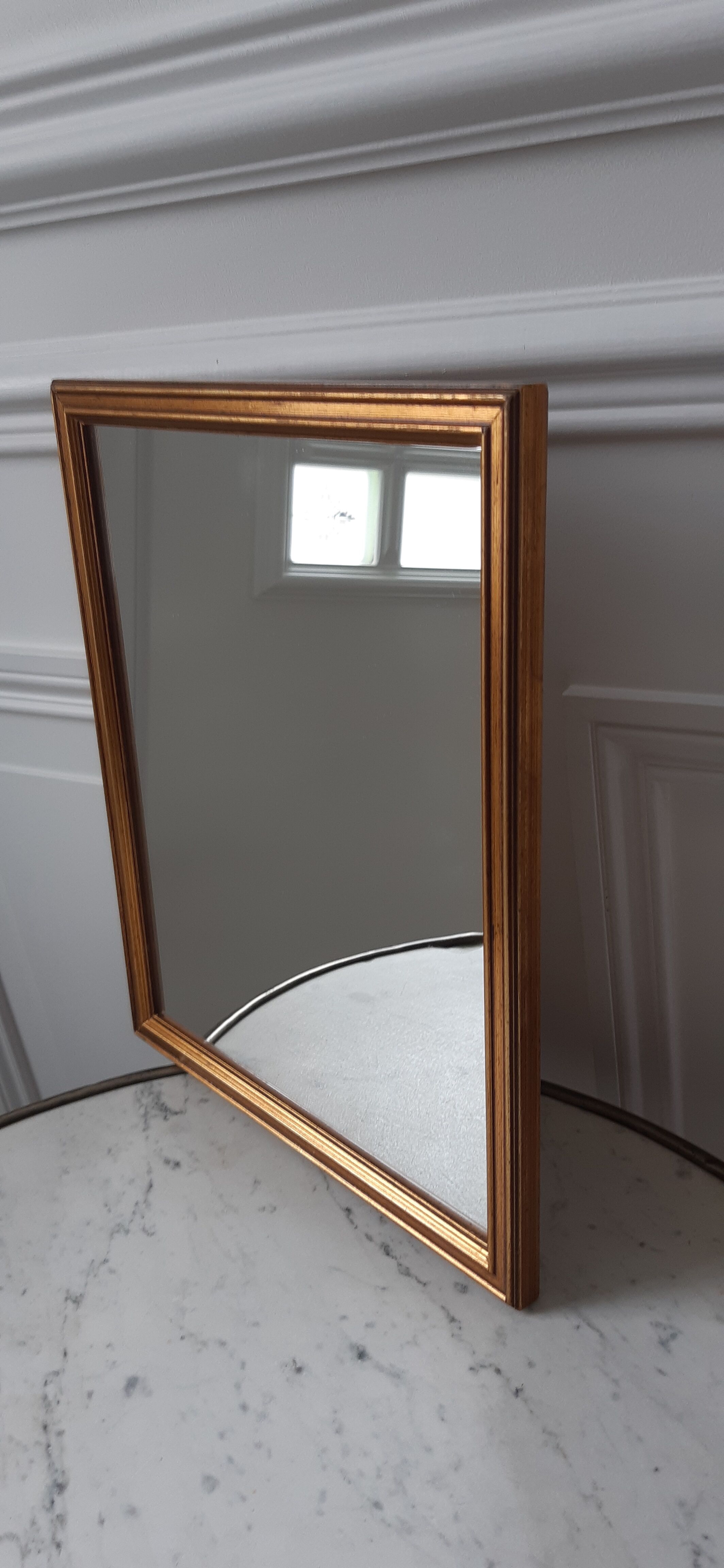 Mirror in gilded wood to hang 50s