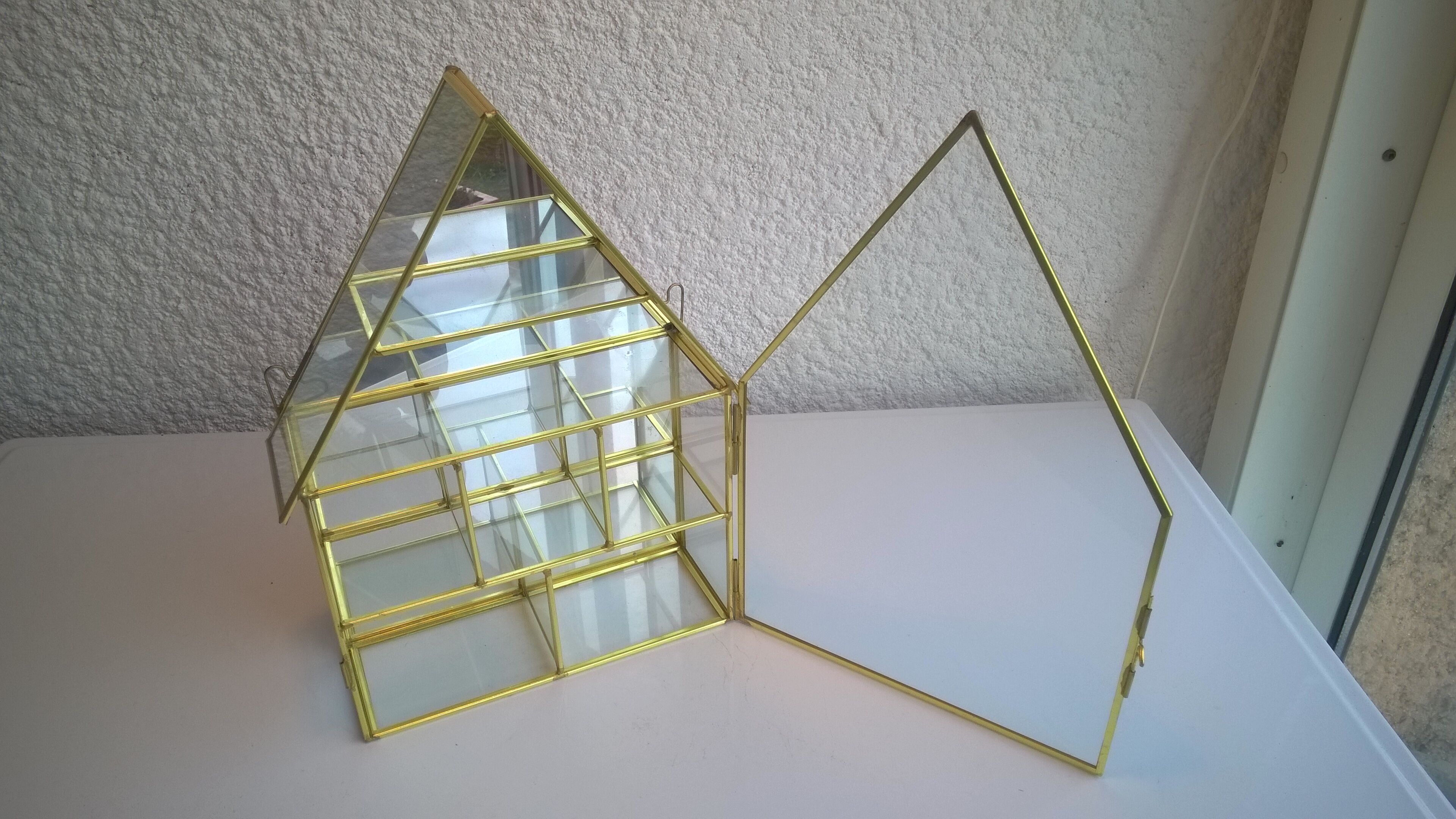 Laiton and glass window