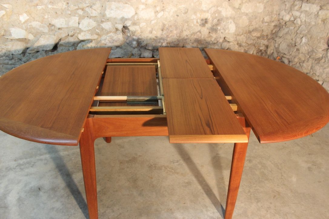 Scandinavian vintage teak dining table with 2 extension cords hidden by Svend Aage Madsen for Knudsen - Son, Denmark
