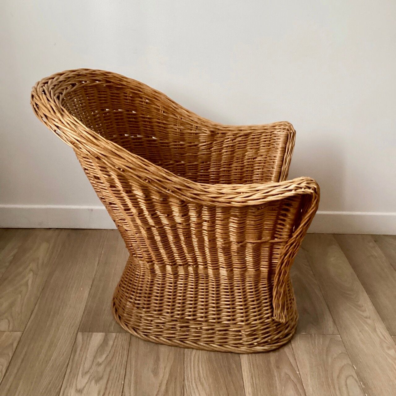 Braided wicker armchair